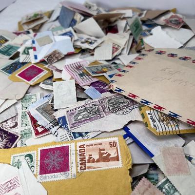 Huge pile of vintage stamps unsorted