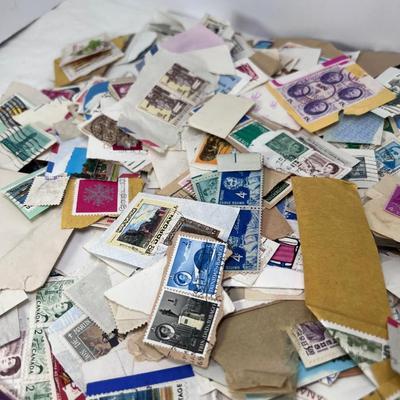 Huge pile of vintage stamps unsorted