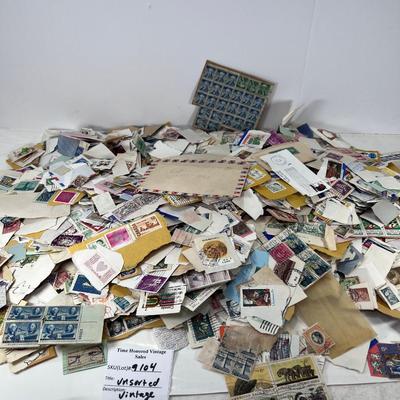 Huge pile of vintage stamps unsorted
