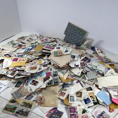 Huge pile of vintage stamps unsorted