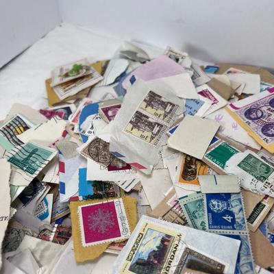 Huge pile of vintage stamps unsorted