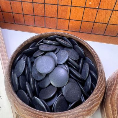 The Go Game Heavy tabletop wooden board with vintage black and white stones. Good ondition