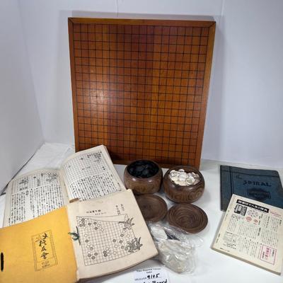 The Go Game Heavy tabletop wooden board with vintage black and white stones. Good ondition