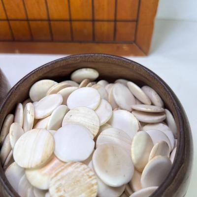 The Go Game Heavy tabletop wooden board with vintage black and white stones. Good ondition