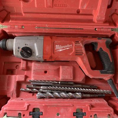 Milwaukee Handheld Power Drill and Case