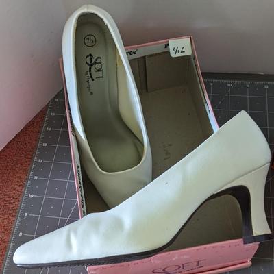 White and Black Pumps