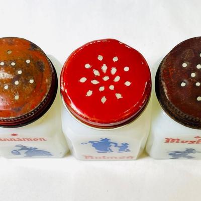 Vintage milk glass spice shakers