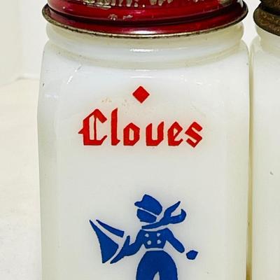 Vintage milk glass spice shakers