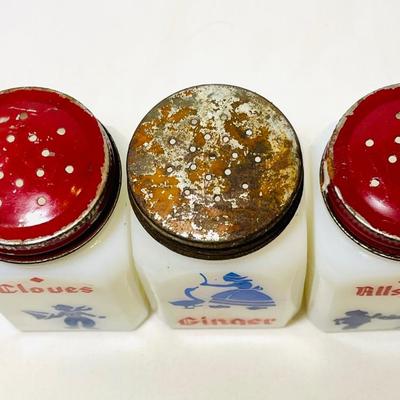 Vintage milk glass spice shakers