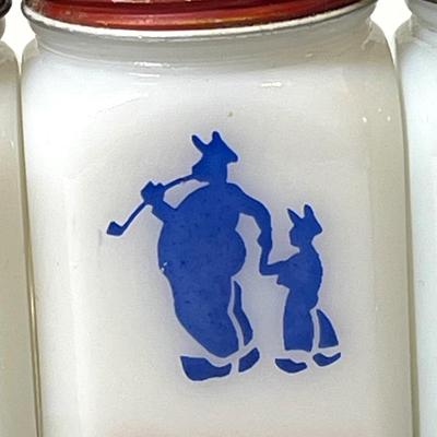 Vintage milk glass spice shakers