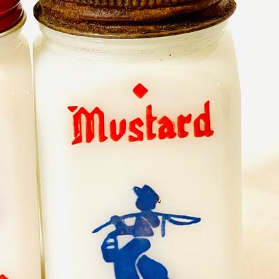 Vintage milk glass spice shakers