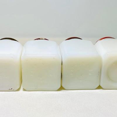 Vintage milk glass spice shakers