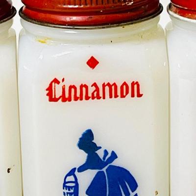 Vintage milk glass spice shakers