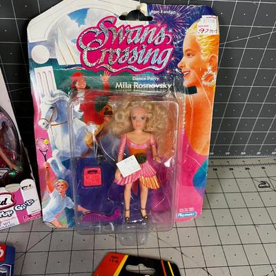 4 Action Figure Dolls on the Card