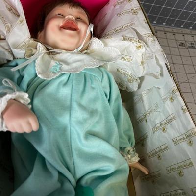 Porcelain Baby Doll in Blue Jumper