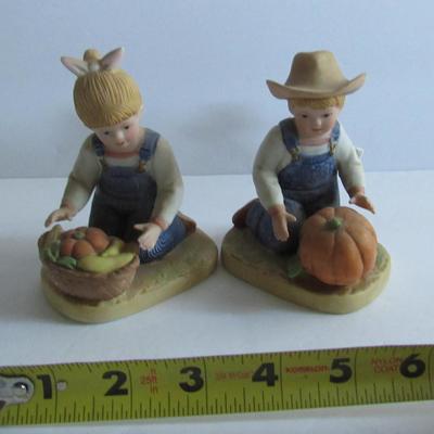 Lot 343:  Older Denim Days Figurine Pair