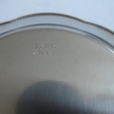 Lot 357: Misc Lot of Kitchen Stuff: Alessi Italy Bowl, Sterling Butter Pat, Granite Hot Pad