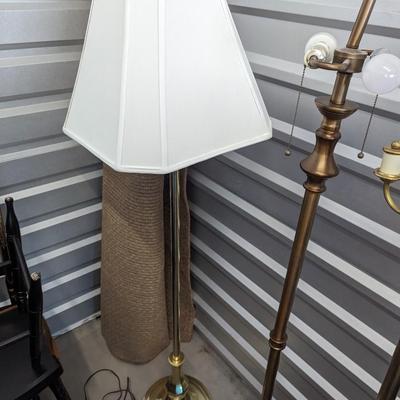 unique floor lamp with white lamp shade.