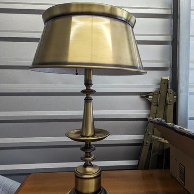 Nice mid century burnished brass lamp with round metal shade.