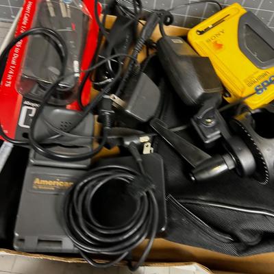 Box of Electronics and Accessories: Camera, Walkman, Game Controller 