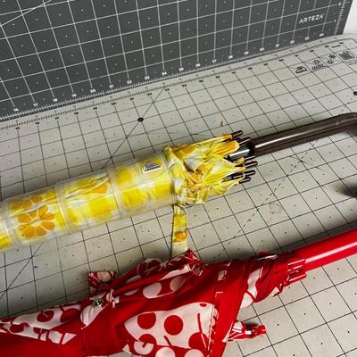 2 Umbrella - Red and a yellow one! 