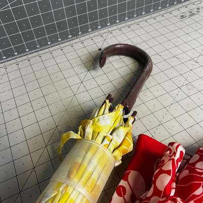 2 Umbrella - Red and a yellow one! 