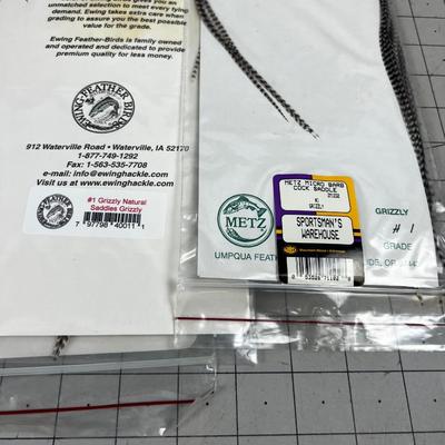 3 Hackle Capes: Grizzly (2) and 1 White 