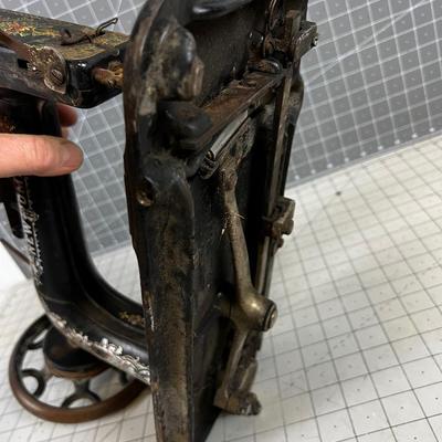 Antique Sewing Machine by NEW HOME