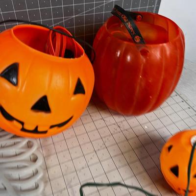 HALLOWEEN is just around the Corner; 1 Arm Skeleton and bunch of pumpkins. 