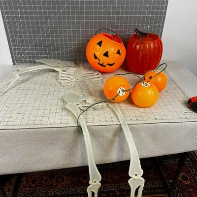 HALLOWEEN is just around the Corner; 1 Arm Skeleton and bunch of pumpkins. 