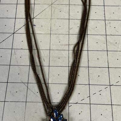 Copper Tone, Antique, Pendant Necklace with Multi Strands Gorgeous Lighter Blue Rhinestones. 