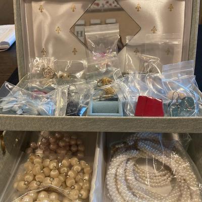 Vintage jewelry box with post earrings and faux pearl necklaces