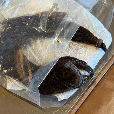 Wig box full of vintage wigs