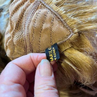 Wig box full of vintage wigs