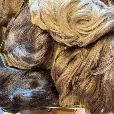 Wig box full of vintage wigs