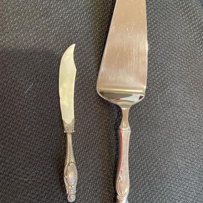 A sterling pie server and mother of pearl spreader