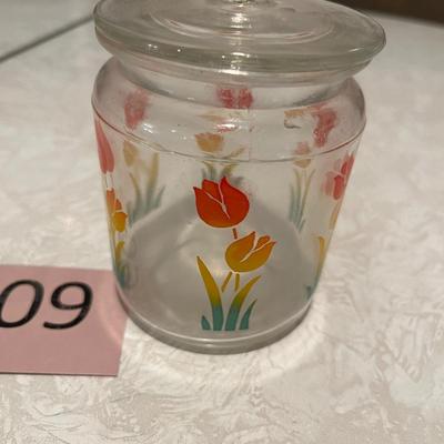 Small glass canister with tulips