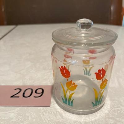 Small glass canister with tulips