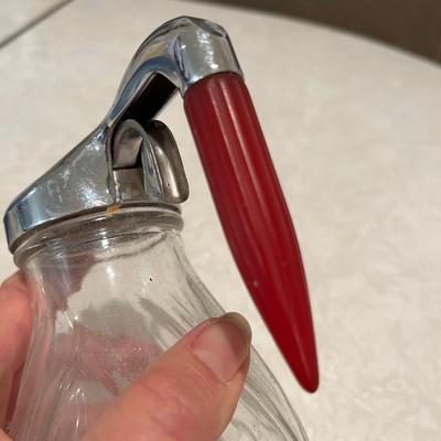 Two vintage syrup dispensers