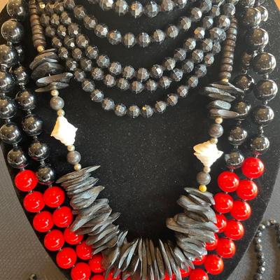 9 black beaded necklaces