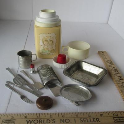 Lot 385: Lot of Kid's Aluminum/Tin Toys and Precious Moments Thermos