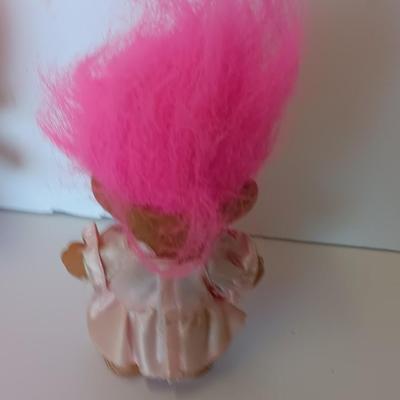 He loves her buns!  Pink haired troll dolls - Boy with I love your buns sign and girl in dress