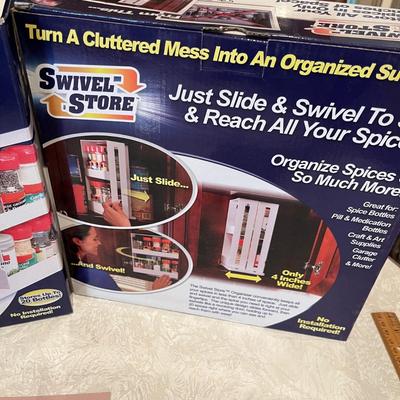 Item 1: New swivel store spice racks