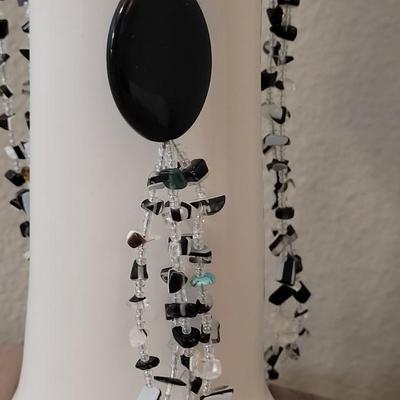 #111: Black Stone Earrings and Black, Clear, and A single Turquoise Bead Necklace