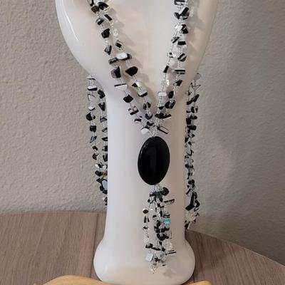 #111: Black Stone Earrings and Black, Clear, and A single Turquoise Bead Necklace
