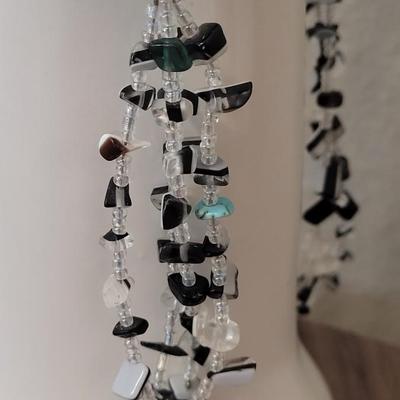#111: Black Stone Earrings and Black, Clear, and A single Turquoise Bead Necklace