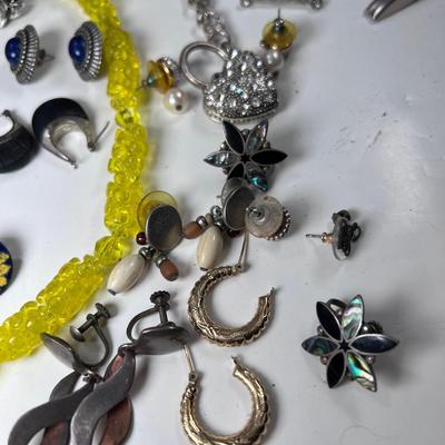 large lot vintage costume jewelry and Wooden Armoire