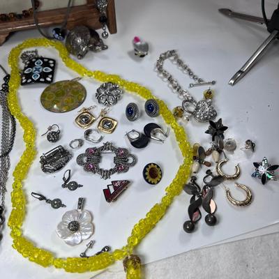large lot vintage costume jewelry and Wooden Armoire