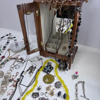 large lot vintage costume jewelry and Wooden Armoire