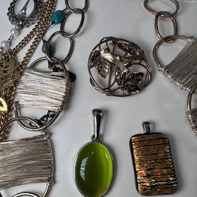 large lot vintage costume jewelry and Wooden Armoire